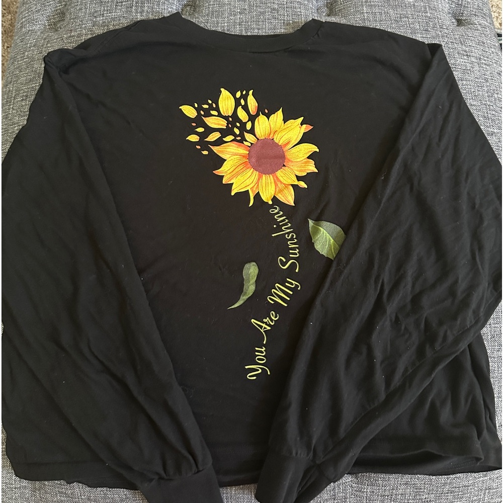 Cropped black long sleeve shirt with sunflower print design